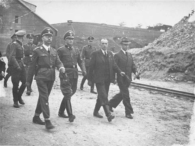 Reichsfuehrer SS Heinrich Himmler and his entourage inspect the Wiener Graben quarry